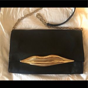 Diane von Furstenburg leather clutch